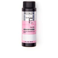 Box  of  Redken  Shades  EQ  Gloss  Bonder  Inside  Color  010T  Platinum,  a  liquid  toner  and  bonder  to  strengthen  sensitized  hair.