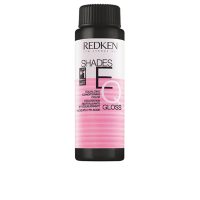 Box  of  Redken  Shades  EQ  Gloss  Color  04WG  Sun  Tea,  a  liquid  demi-permanent  hair  color  for  adding  shine  and  enhancing  tone.