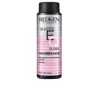 Box  of  Redken  Shades  EQ  Gloss  Bonder  Inside  Color  08NCH,  a  liquid  toner  indicated  for  strengthening  sensitized  hair.