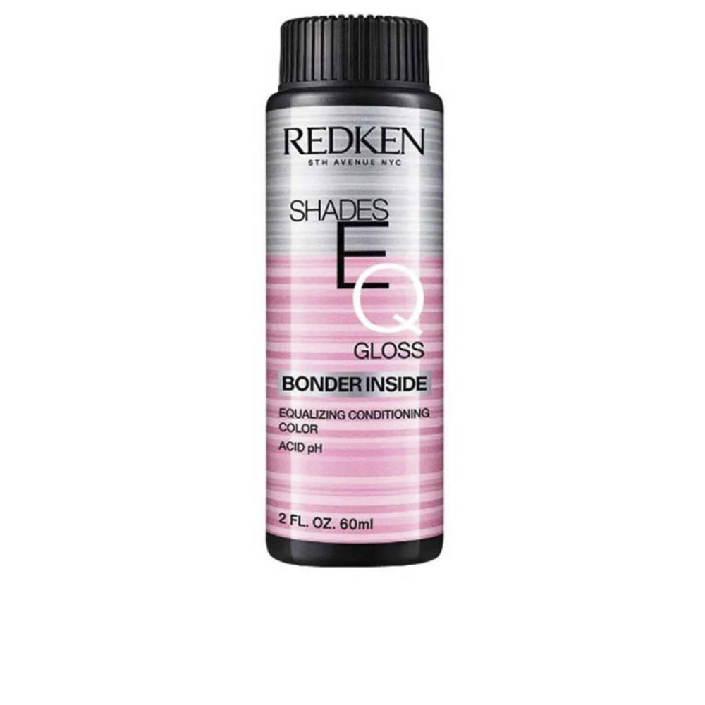 RedkenShadesEQGlossBonderInsideColor07NCHFondue60ml Box of Redken Shades EQ Gloss Bonder Inside Color 07NCH Fondue, a liquid toner indicated for strengthening sensitized hair.