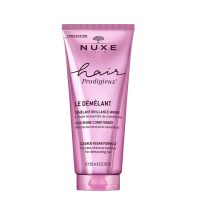 Bottle  of  Nuxe  Hair  Prodigieux  Mirror  Shine  Conditioner  by  Nuxe,  a  conditioner  indicated  for  detangling  and  hair  shine.