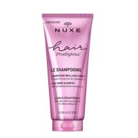 Bottle  of  Nuxe  Hair  Prodigieux  Mirror  Shine  Shampoo  by  Nuxe,  a  shampoo  indicated  for  cleansing  and  illuminating  all  hair  types.