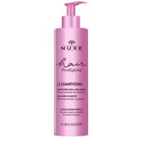 Bottle  of  Nuxe  Hair  Prodigieux  Mirror  Shine  Shampoo  by  Nuxe,  a  shampoo  indicated  for  cleansing  and  illuminating  all  hair  types.