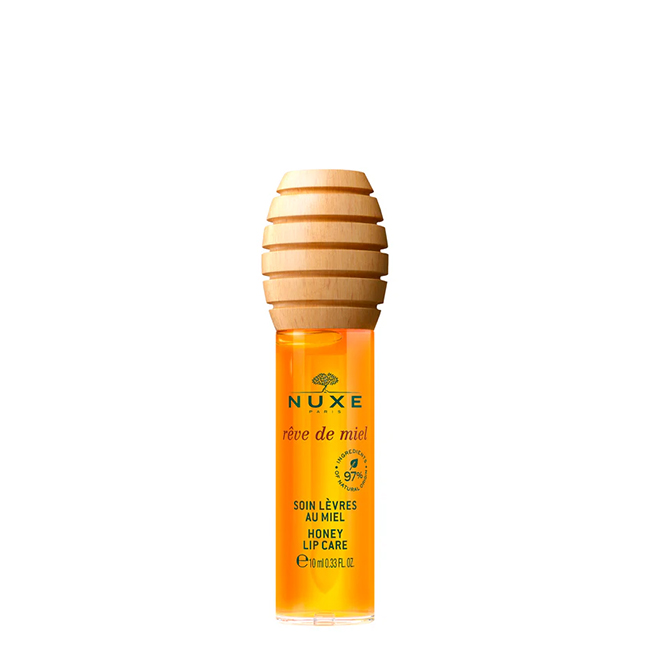 NuxeRêvedeMielHoneyLipCare10ml Bottle of Nuxe Rêve de Miel Honey Lip Care by Nuxe, a liquid oil indicated for nourishing and repairing chapped lips.