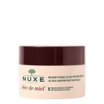 Jar of Nuxe Rêve de Miel Ultra-Comforting Face Balm by Nuxe, a rich balm indicated for nourishing and soothing dry facial skin.