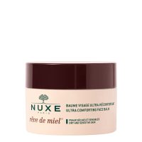 Jar  of  Nuxe  Rêve  de  Miel  Ultra-Comforting  Face  Balm  by  Nuxe,  a  rich  balm  indicated  for  nourishing  and  soothing  dry  facial  skin.