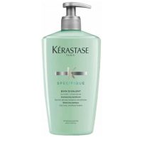 Bottle  of  K  Spécifique  Divalent  Shampoo  by  Kérastase,  a  creamy  shampoo  indicated  for  oily  roots  and  dry  ends.