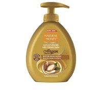 Bottle  of  Natural  Honey  Argan  Addiction  Liquid  Soap  by  Natural  Honey,  a  liquid  soap  indicated  for  cleansing  and  nourishing  skin.