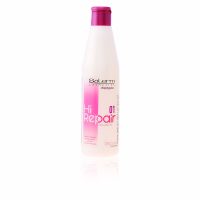 Bottle  of  Salerm  Hi  Repair  Shampoo  by  Salerm,  a  liquid  shampoo  indicated  for  cleansing,  restructuring  and  treating  damaged  hair.