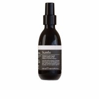 Bottle  of  Sendo  Styling  Liquid  Crystal  by  Sendo,  a  silky  serum  indicated  for  fighting  frizz  and  protecting  against  humidity.