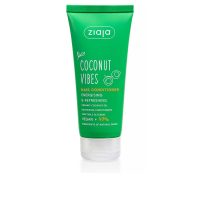 Bottle  of  Ziaja  Coconut  Vibes  Energizing  Conditioner  by  Ziaja,  a  conditioner  indicated  to  prevent  frizz  and  add  glow.
