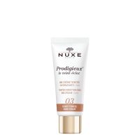 Tube  of  Nuxe  Prodigieux  BB  Cream  Dark  Tone  by  Nuxe,  a  BB  cream  indicated  for  long-lasting  hydration  and  evening  skin  tone.