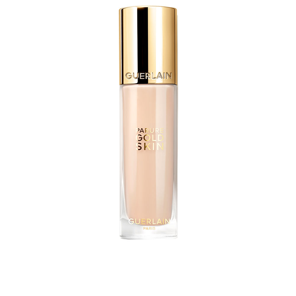 Bottle  of  Guerlain  Parure  Gold  Skin  Fluid  Makeup  Foundation  Color  1C  by  Guerlain,  a  foundation  indicated  for  a  luminous  effect.