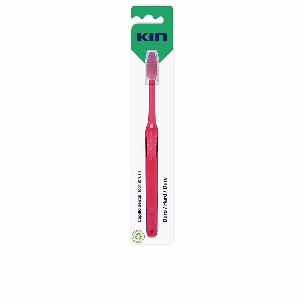 Product  container  of  Kin  Hard  Toothbrush  by  Kin,  a  hard  bristle  toothbrush  indicated  for  thorough  plaque  removal.