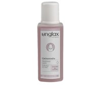 Bottle  of  Unglax  Nail  Experts  Nail  Polish  Remover  by  Unglax,  a  liquid  indicated  for  removing  nail  polish  without  drying  nails.