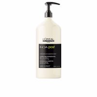 Bottle  of  LOréal  Professionnel  Inoa  Post  Shampoo  by  LOréal,  a  post  coloration  shampoo  indicated  for  sealing  hair  color.