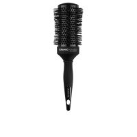 Product  container  of  Lussoni  Hourglass  Brush  53mm  by  Lussoni,  a  thermal  round  brush  indicated  for  shaping  hair  when  blow  drying.