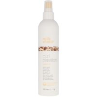 Spray  of  Milk  Shake  Curl  Passion  Leave-In  Spray  by  Milk  Shake,  a  styling  spray  indicated  for  defining  voluminous  curls.