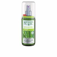 Spray  of  Natur  Vital  Hair  Control  Spray  by  Natur  Vital,  a  styling  spray  indicated  for  preventing  frizz  and  adding  shine  to  hair.