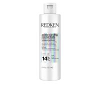 Bottle  of  Redken  Acidic  Bonding  Concentrate  Intensive  Treatment  by  Redken,  a  pre-shampoo  care  indicated  for  hair  repair.