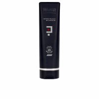 Bottle  of  Salerm  Homme  Anti-Dandruff  Exfoliating  Shampoo  by  Salerm  Homme,  a  shampoo  indicated  for  removing  adhered  dandruff.