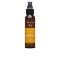 Bottle  of  Apivita  Keratin  Repair  Nourish  and  Repair  Hair  Oil  by  Apivita,  a  hair  oil  indicated  for  frizz  control  and  heat  protection.