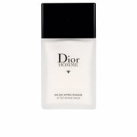 Bottle  of  Dior  Homme  After-Shave  Balm  by  Dior,  a  soothing  balm  indicated  for  calming  shaving  irritation  and  hydrating  skin.
