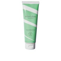 Bottle  of  Bouclème  Curls  Redefined  Scalp  Exfoliating  Shampoo  by  Bouclème,  a  creamy  shampoo  indicated  for  exfoliating  the  scalp.