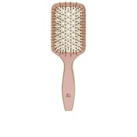 Product  container  of  Ilū  Bamboom  Paddle  Medium  Brush  by  Ilū,  a  bamboo  brush  indicated  for  smoothing  and  detangling  hair.