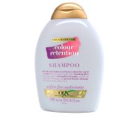 Bottle  of  Ogx  Color  Retention  Hair  Shampoo  by  Ogx,  a  lightweight  shampoo  indicated  for  protecting  dyed  hair  color.
