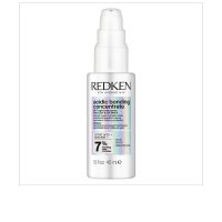 Bottle  of  Redken  Acidic  Bonding  Concentrate  Day  And  Night  Serum  by  Redken,  a  bond  repair  serum  indicated  for  damaged  hair.