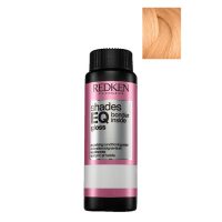 Box  of  Redken  Shades  EQ  Bonder  Inside  Color  010GI  -  10.32,  a  liquid  toner  indicated  for  strengthening  sensitized  hair.