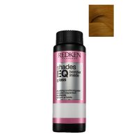 Box  of  Redken  Shades  EQ  Bonder  Inside  Color  06G  -  6.3,  a  liquid  toner  indicated  for  strengthening  sensitized  hair.