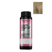 Box  of  Redken  Shades  EQ  Bonder  Inside  Color  07N,  a  liquid  toner  indicated  for  strengthening  and  toning  sensitized  hair.