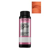 Box  of  Redken  Shades  EQ  Bonder  Inside  Color  09CR,  a  liquid  toner  indicated  for  strengthening  and  toning  sensitized  hair.