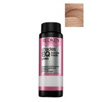 Box  of  Redken  Shades  EQ  Bonder  Inside  Color  09GRO,  a  liquid  toner  indicated  for  strengthening  and  toning  sensitized  hair.