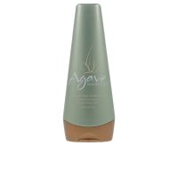 Bottle  of  Agave  Healing  Oil  Smoothing  Shampoo  by  Agave,  a  shampoo  indicated  for  moisturizing  hair  and  taming  frizz.