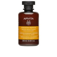 Bottle  of  Apivita  Keratin  Repair  Shampoo  by  Apivita,  a  nourishing  shampoo  indicated  for  repairing  dry  and  damaged  hair.