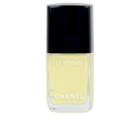 Bottle  of  Chanel  Le  Vernis  Nail  Polish  Color  129  OVNI  by  Chanel,  a  nail  polish  indicated  for  a  shiny  lacquered  finish.