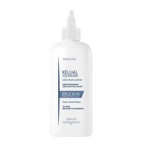 Bottle  of  Kelual  Squanorm  Fresh  Lotion  Control  by  Ducray,  a  hair  lotion  indicated  for  eliminating  dandruff  and  scalp  irritation.