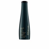 Bottle  of  Shu  Uemura  Ultimate  Reset  Shampoo  by  Shu  Uemura,  a  shampoo  indicated  for  repairing  and  nourishing  damaged  hair.