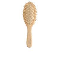 Product  container  of  Steinhart  Nature  Oval  Brush  #264  by  Steinhart,  a  wooden  brush  indicated  for  gentle  hair  brushing.