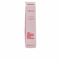 Bottle  of  Trendy  Hair  Shikiso  Keratin  &  Ginseng  Lait  by  Trendy  Hair,  a  creamy  conditioner  indicated  for  colored  hair  repair.