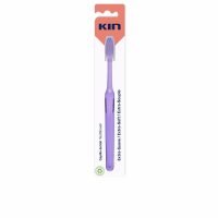 Product  container  of  Kin  Extra-Soft  Toothbrush  by  Kin,  a  toothbrush  indicated  for  thorough  oral  hygiene  and  plaque  removal.