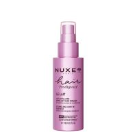 Spray  of  Nuxe  Hair  Prodigieux  Detangling  Leave-In  Hair  Milk  by  Nuxe,  a  hair  milk  indicated  for  detangling  and  hydration.