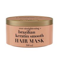 Jar  of  Ogx  Brazilian  Keratin  Smooth  Hair  Mask  by  Ogx,  a  creamy  mask  indicated  for  hydrating  and  strengthening  damaged  hair.