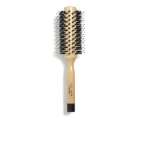 Product  container  of  Sisley  Hair  Rituel  The  Blow  Dry  Brush  No  2  by  Sisley,  a  round  brush  indicated  for  straightening  curly  hair.