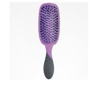 Product  container  of  The  Wet  Brush  Professional  Pro  Shine  2.0  Enhancer  by  The  Wet  Brush,  a  hairbrush  indicated  for  detangling  hair.