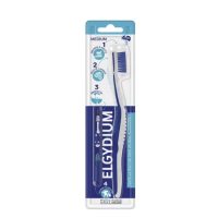 Product  container  of  Elgydium  4-in-1  Medium  Toothbrush  by  Elgydium,  a  medium  toothbrush  indicated  for  removing  plaque  and  surface  stains.