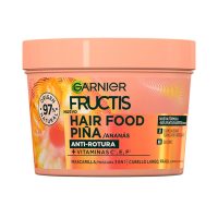 Jar  of  Garnier  Fructis  Hair  Food  Pineapple  Anti-Breakage  Mask  by  Garnier,  a  mask  indicated  for  strengthening  fragile  hair.